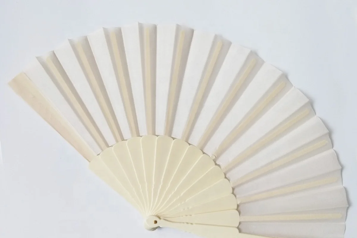 White folding fan seen from the back, with pale ribs visible across the leaf.