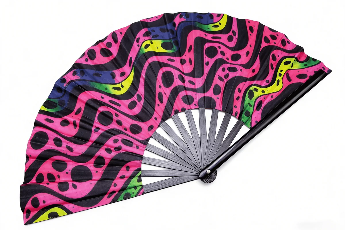 Pink patterned folding fan with black ribs and a visible pivot.
