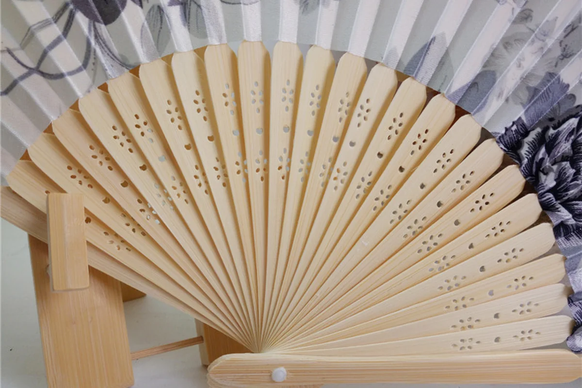 Paper vs Fabric for Folding Hand Fans