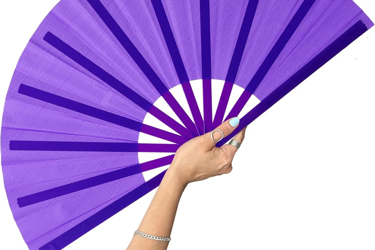 Purple folding fan held open to show its supporting ribs.