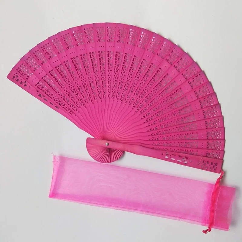 Bright pink lattice folding fan with a matching drawstring pouch