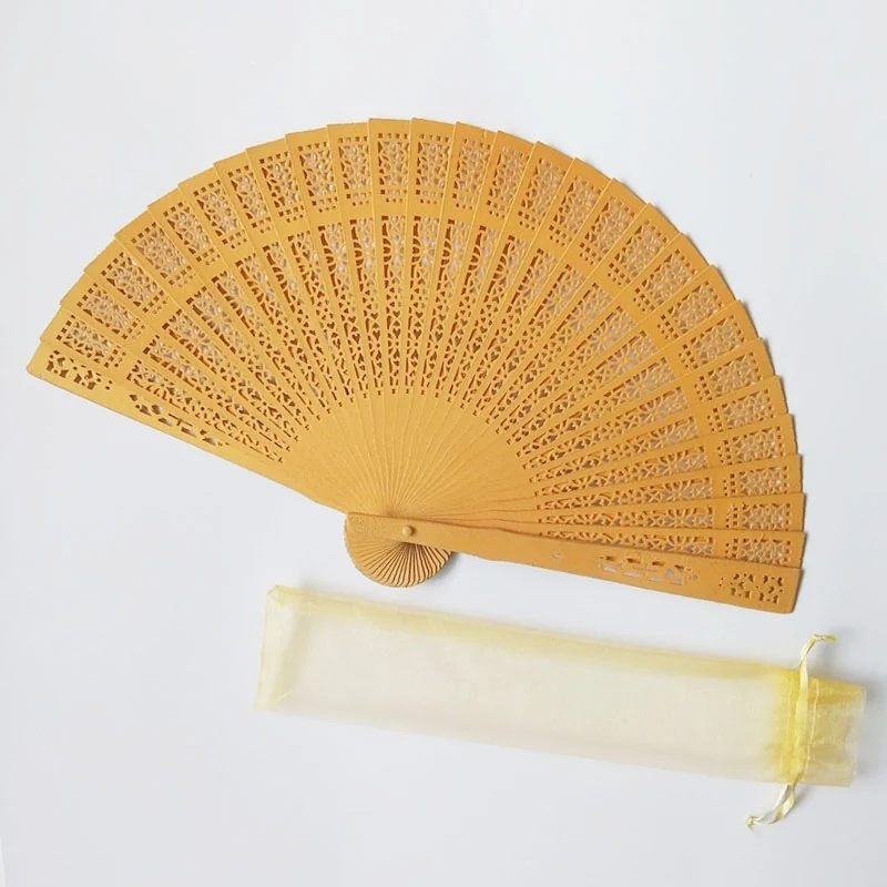 Yellow lattice folding fan with a coordinated light yellow pouch