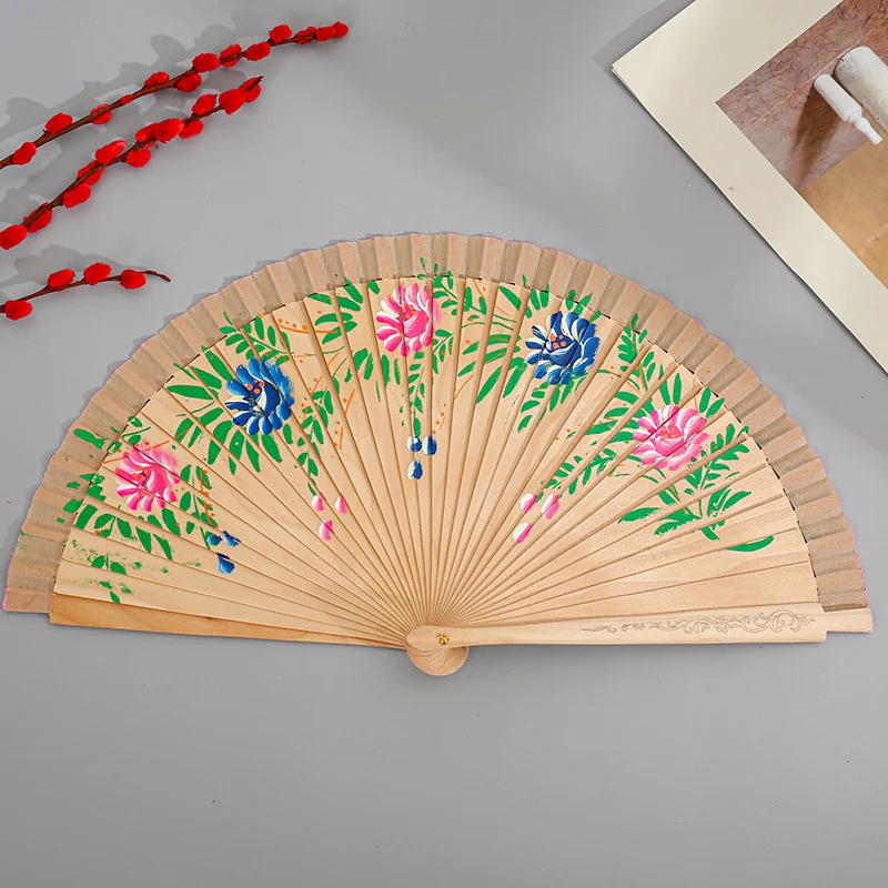 Natural tone folding fan decorated with pink and blue flowers