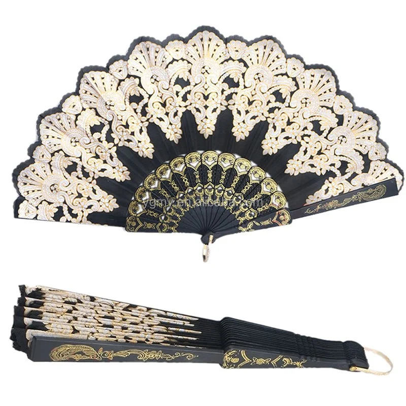 Black and cream ornamental folding fan shown open and folded