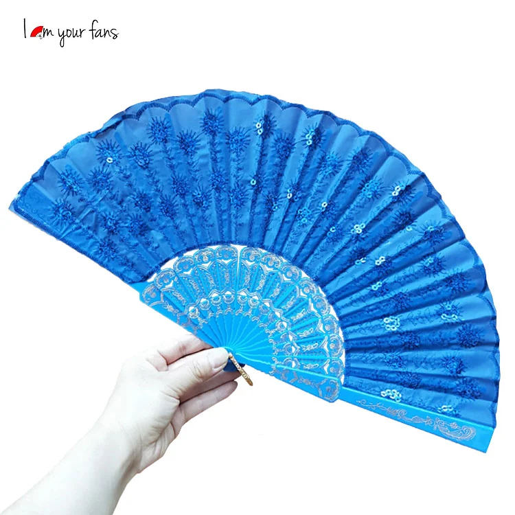 Blue color version of the decorative folding fan held open