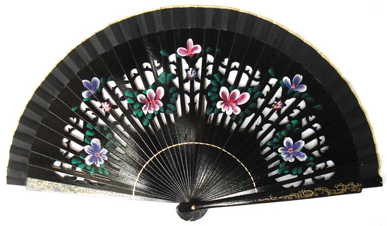 Black folding fan with decorative openings and scattered flowers