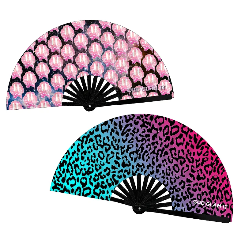 Folding fan with pink dripping smiley faces above a blue and pink leopard-print fan