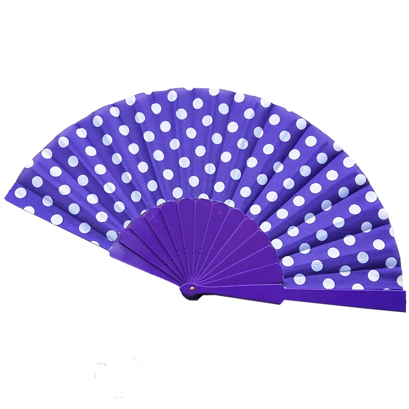 Purple folding fan with white polka dots and a matching purple frame