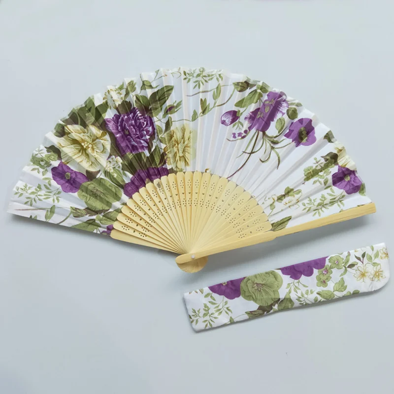 Purple and green floral folding fan with coordinated printed sleeve