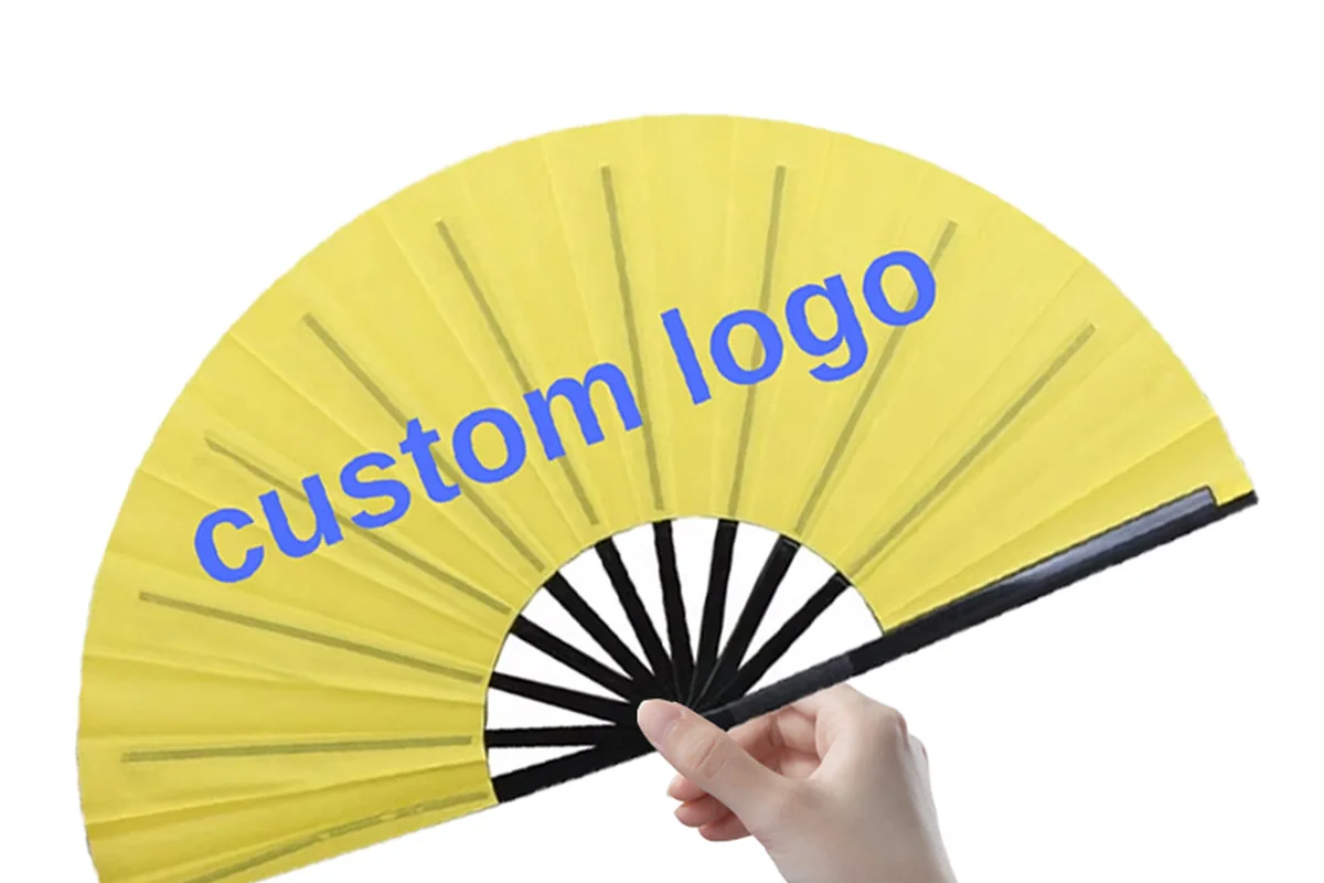 Yellow folding fan with sample logo lettering held in one hand.
